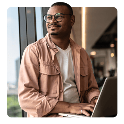 Person sitting at laptop Person sitting at laptop