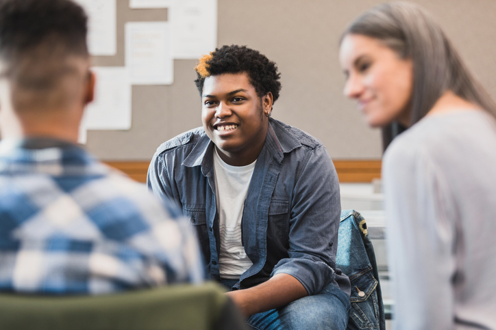 diverse students conversing